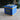 D.E.C.K. deck box closed showing yellow and steel vault-door aesthetic with rotating wheel